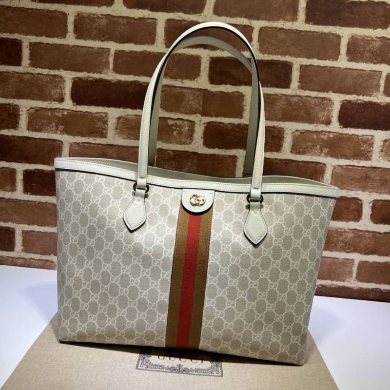 G*u*i shopping bags